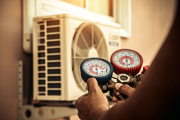 Professional Hvac technician working in Eastport, NY